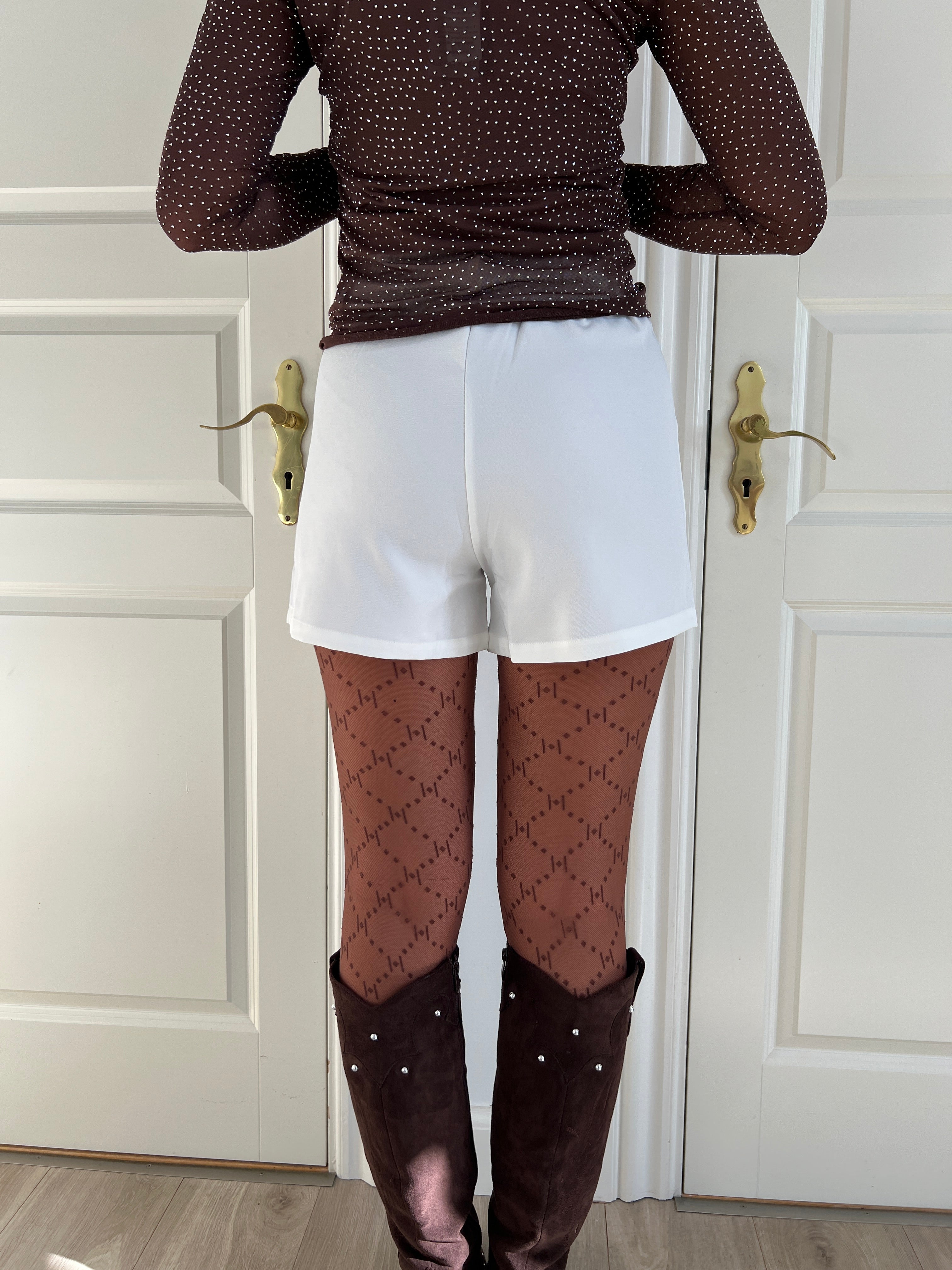 Its May white shorts