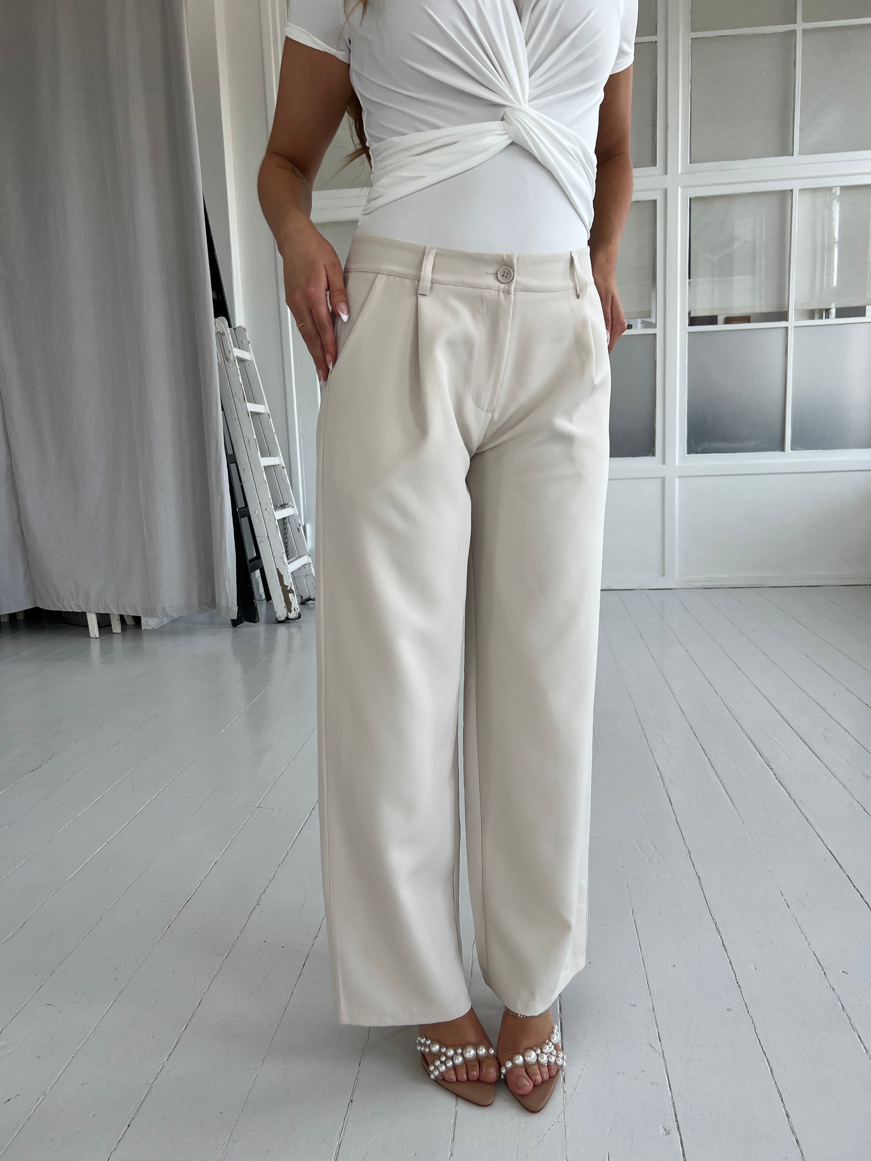 Eight Luxe cream trousers