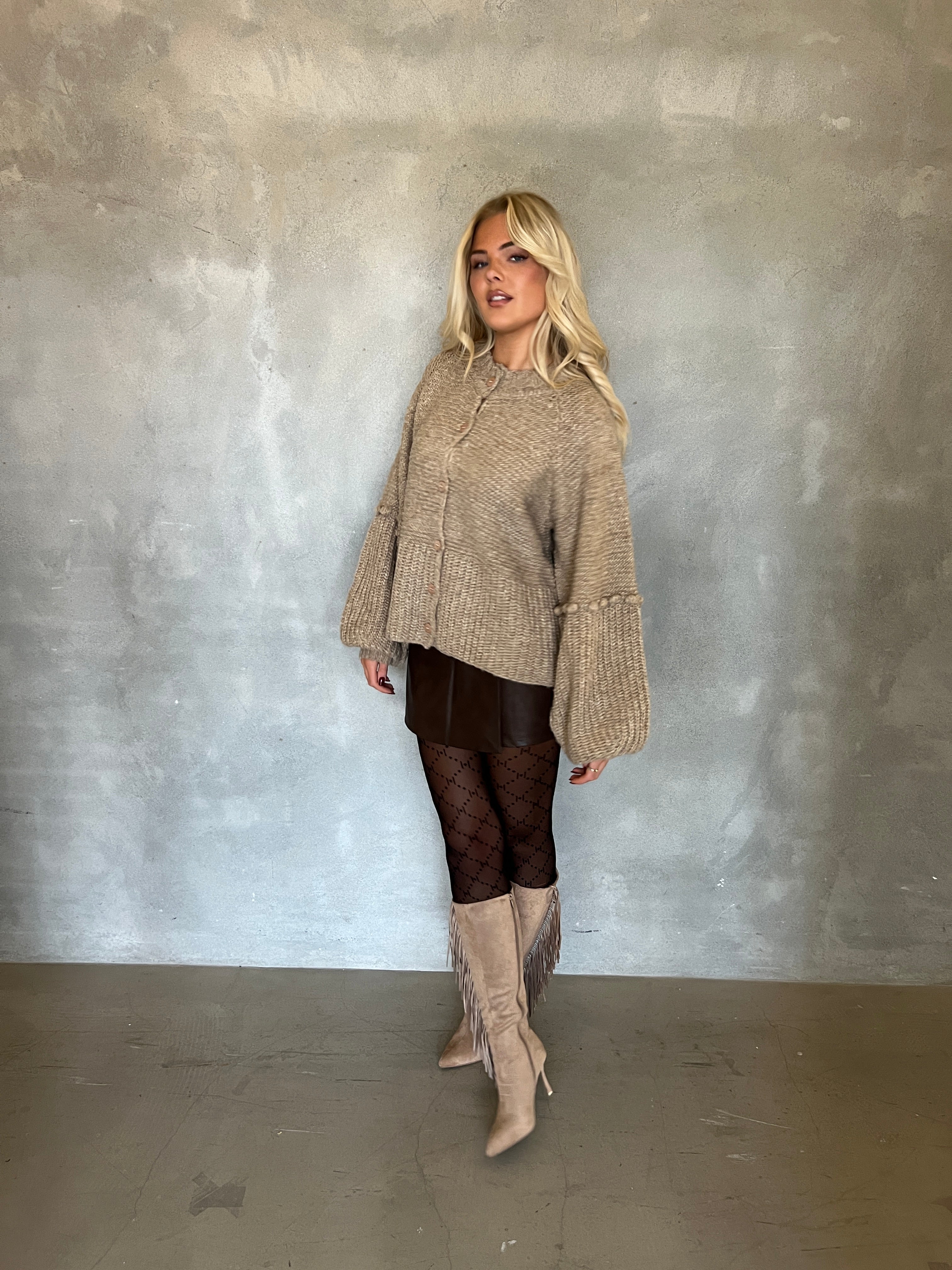 Chunky knit cardigan with pom-poms