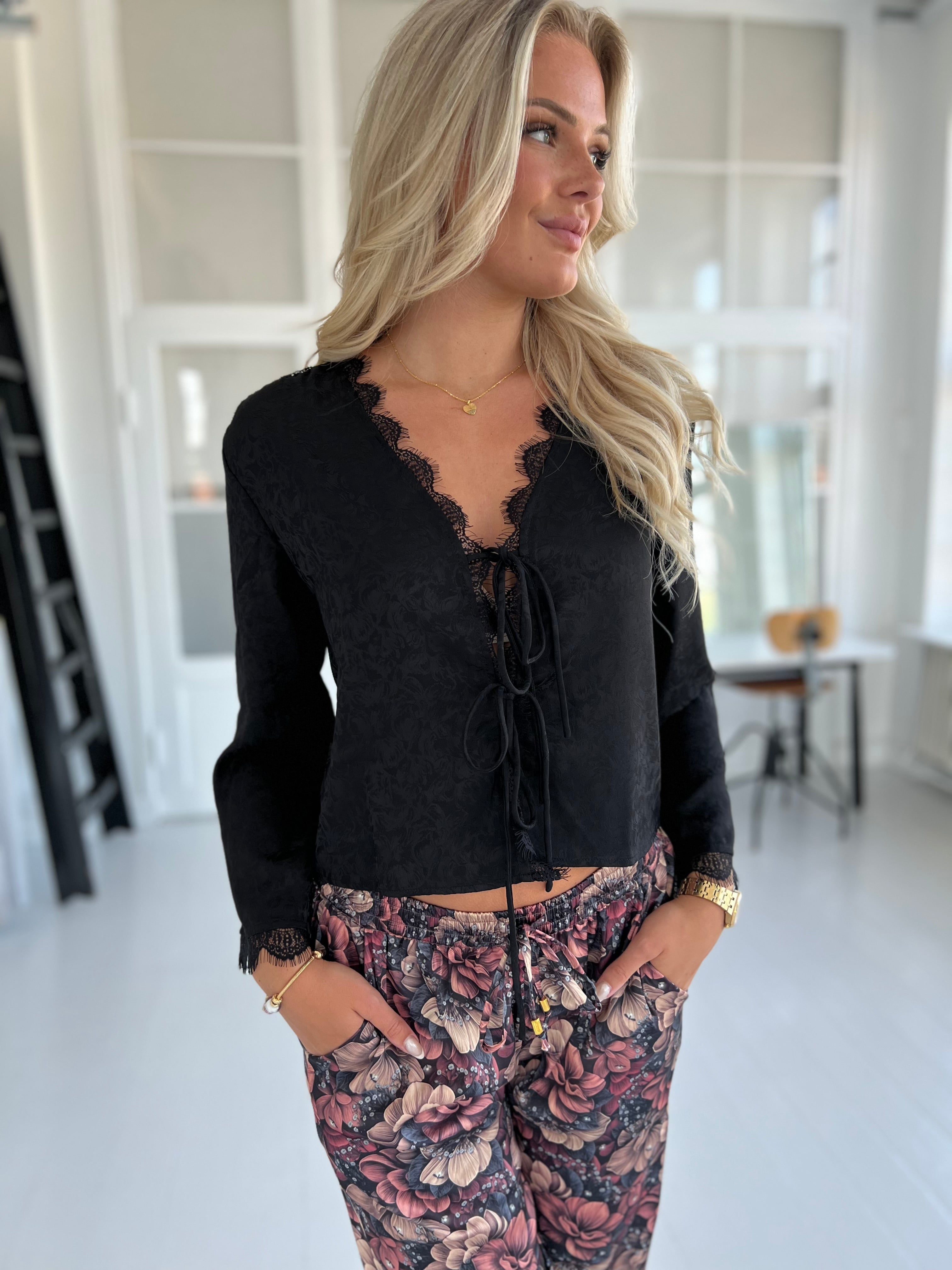Lovie and Co black blouse